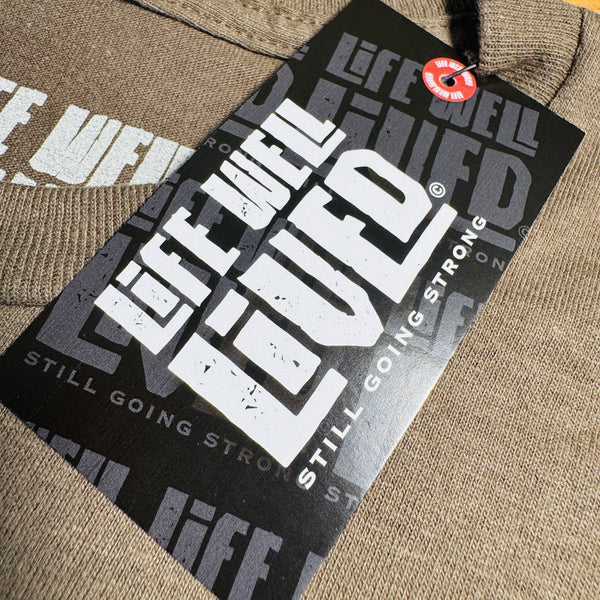 Life Well Lived branded swing tag for the Grow Bigger gardening T‑Shirt.