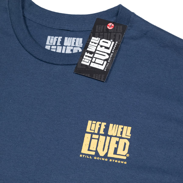 This classic men's back print graphic tee shirt, on Blue dusk colour. Design is of an older style road racer style push bike, above the image of the bike is written 'Professional Cycologist'. Graphics are in a golden yellow colour.