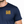 Front chest view of navy cycling T‑shirt featuring small yellow Life Well Lived Still Going Strong text on the left chest.