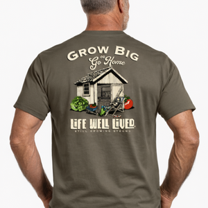 Man wearing a t-shirt with a graphic and text on the back, on a white background