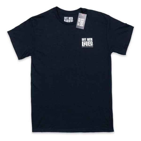 Mens graphic Tee in Black, red and yellow image on shoulders saying 'Life Well Lived Hometown hero'.