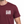 Maroon t-shirt with 'Life Well Lived' text on a white background