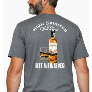 Man wearing a gray t-shirt with a graphic design on the back, featuring text and an image of a bottle.